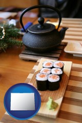 colorado map icon and sushi and green tea being served at a Japanese restaurant