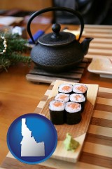 idaho map icon and sushi and green tea being served at a Japanese restaurant