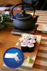 massachusetts map icon and sushi and green tea being served at a Japanese restaurant