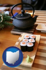 ohio map icon and sushi and green tea being served at a Japanese restaurant