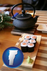 vermont map icon and sushi and green tea being served at a Japanese restaurant
