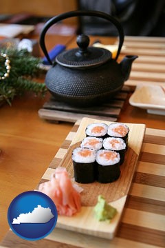 sushi and green tea being served at a Japanese restaurant - with Kentucky icon