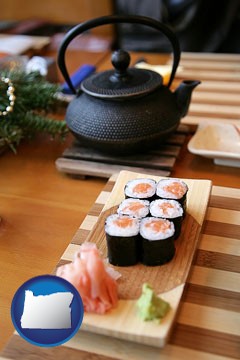 sushi and green tea being served at a Japanese restaurant - with Oregon icon